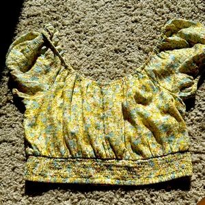 Cute off the shoulder top with ribbed waist band